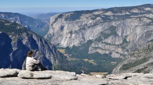 Admiring the view on top of Half Dome.