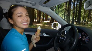 Lupita enjoying her ice cream, hey eyes on the road!