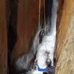 Pulling the rope after the first rappel.