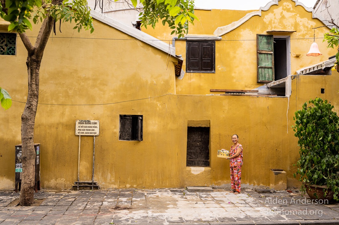 Sa next to her house after the flood in Hoi An