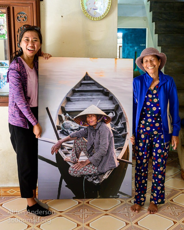 Sau with her photo, Hoi An, Vietnam