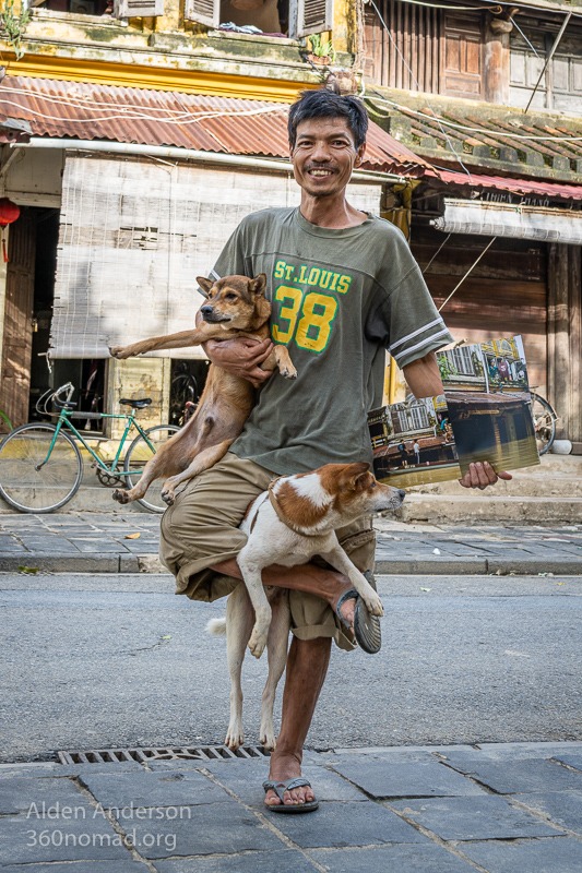 Tuan with dogs and photos