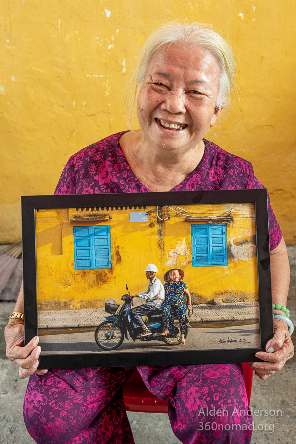 Hue with her photo. Hoi An, Vietnam